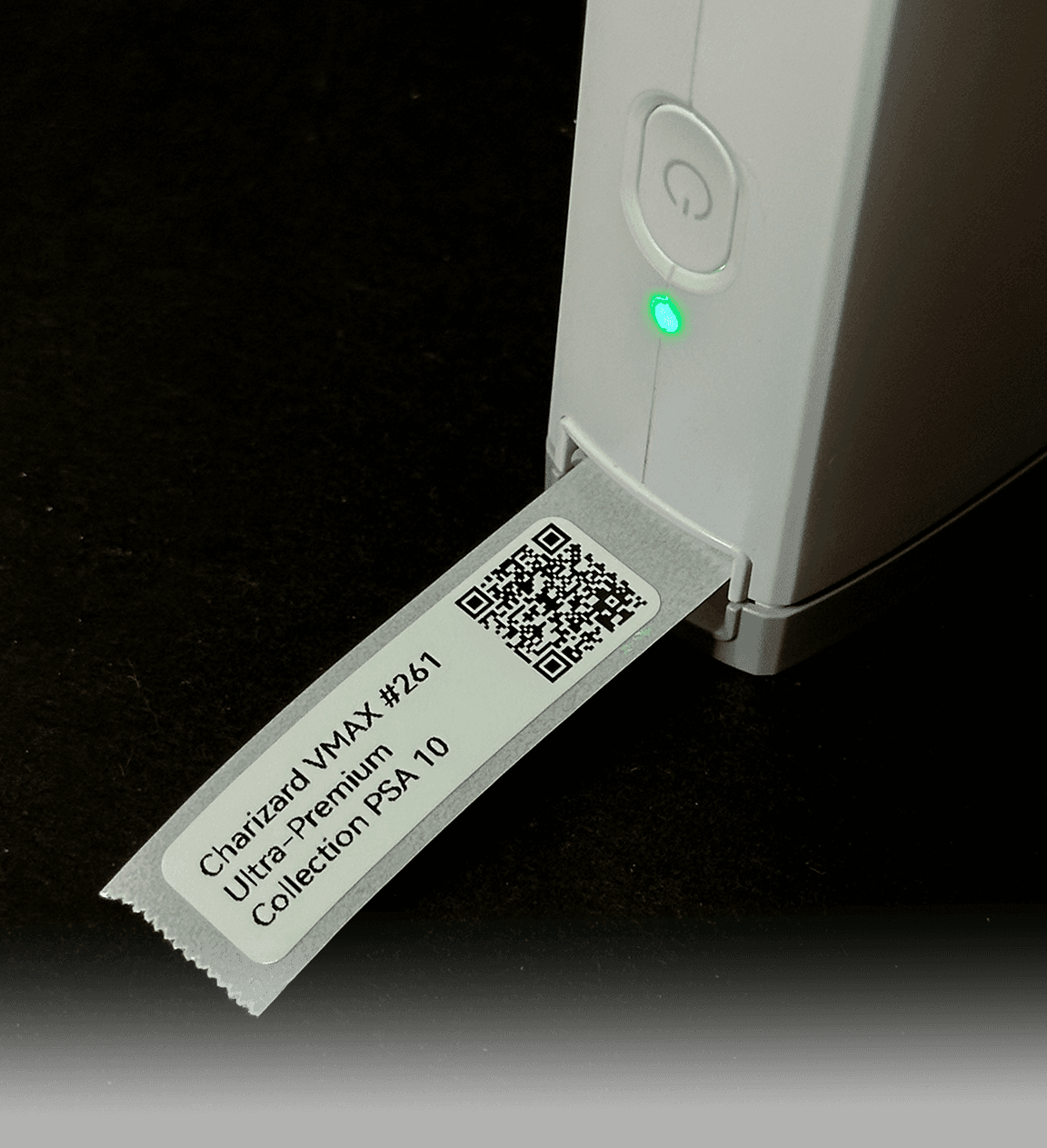 Portable NIIMBOT thermal printer with a printed SnapSale QR label